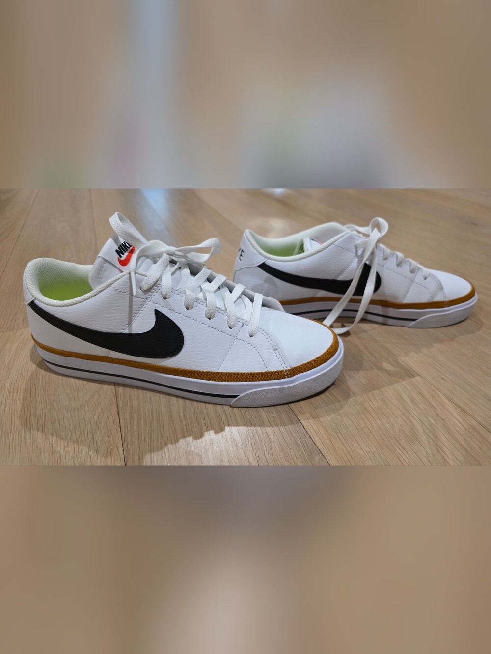 Nike Kids' White Low-Top Sneakers with Black Swoosh